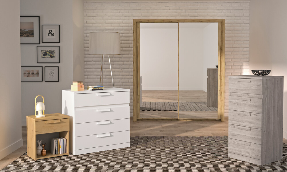 Uma cómoda pintada de branco fica sempre bem em qualquer quarto moveis madeira